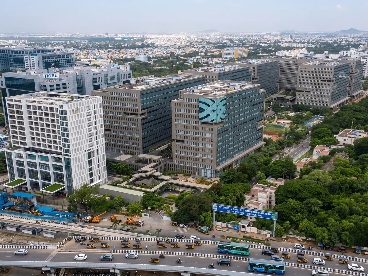 Aerial view of Chennai's OMR (Old Mahabalipuram Road) IT corridor and office campuses served by PropSquare facility management