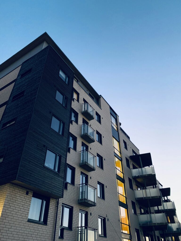 City Facility Management - Gated Communities and Co-living Residential apartment building representing gated communities and co-living spaces under PropSquare facility management